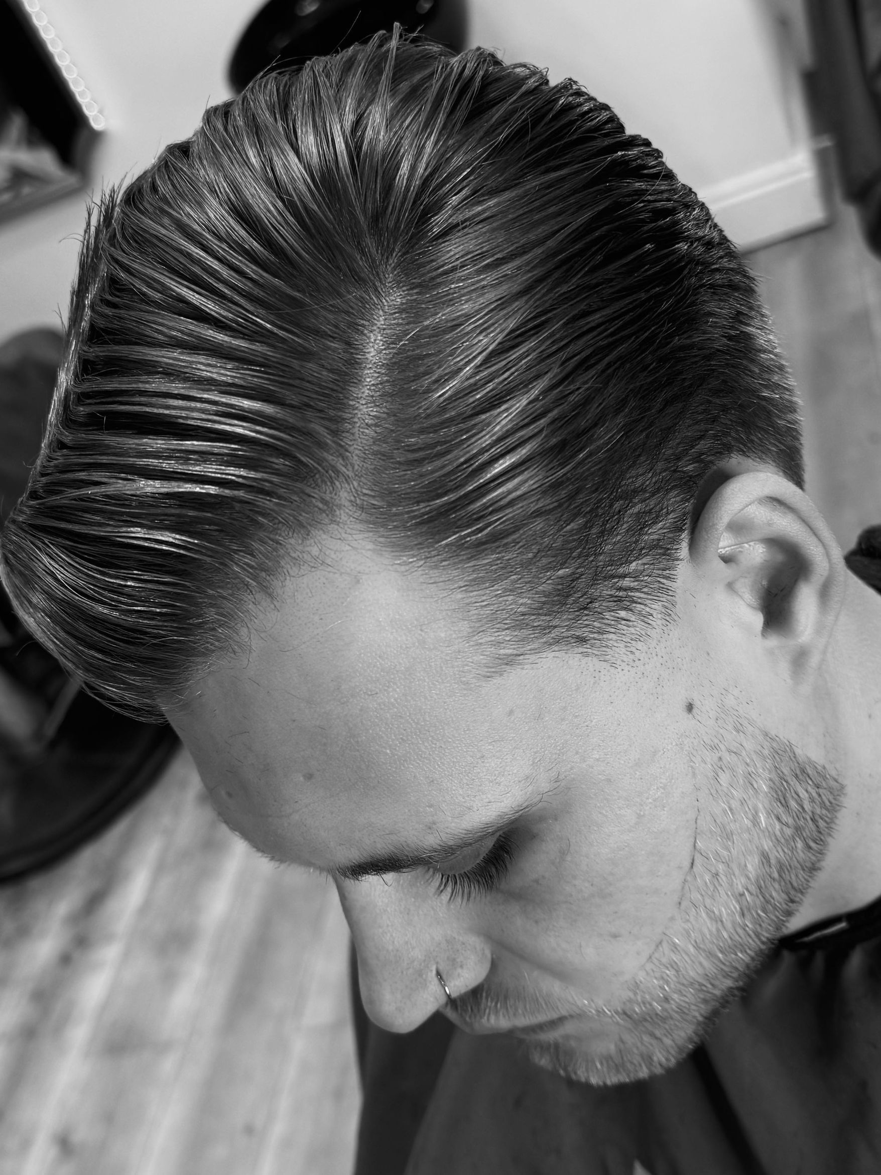Classic slick back hairstyle in black and white